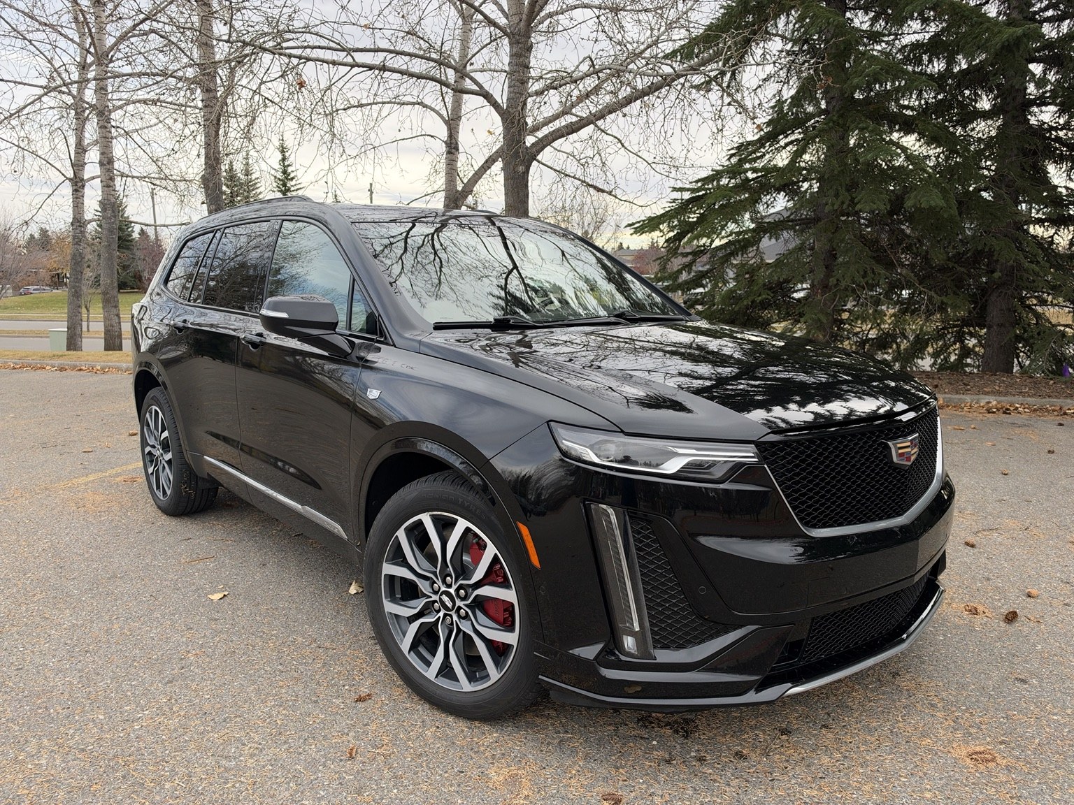 Black Cadillac XT6, front view from the other angle