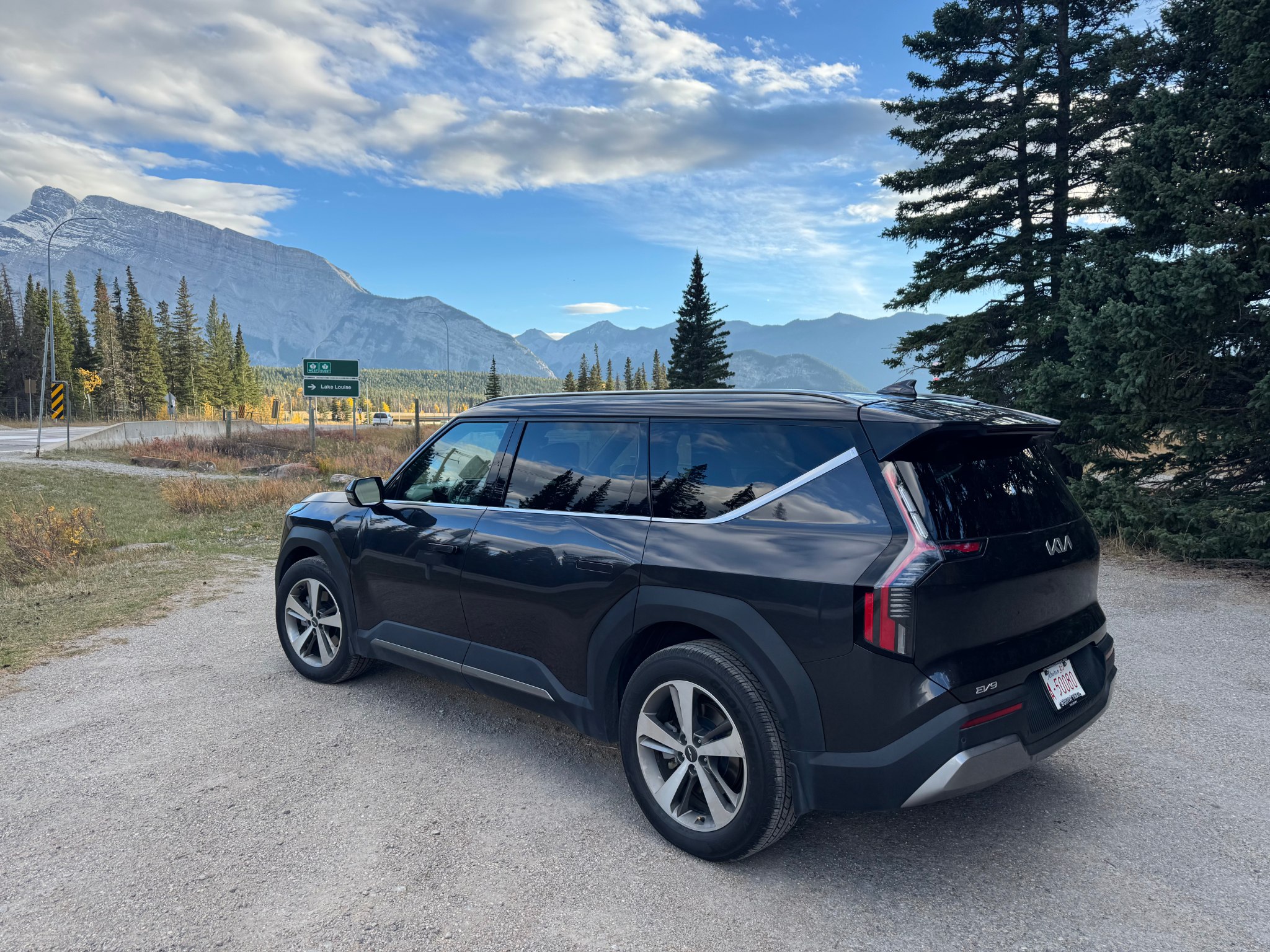 Black Kia EV9, rear three-quarter view in the Canadian Rockies